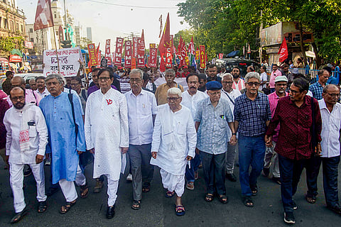 Left Front Chairman Biman Bose, CPI(M)'s West Bengal unit secretary Mohammed Salim and others take part in a protest march towards the Chief Election Commissioner's Office against the Special Intensive Revision (SIR) of electoral rolls, ahead of the West Bengal Assembly elections, in Kolkata.