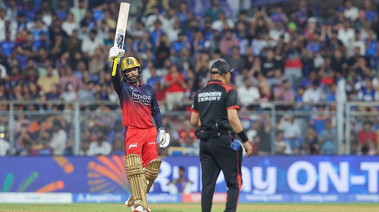 Rajat Patidar celebrating his half-century during MI vs RCB IPL 2026 match at Wankhede Stadium in Mumbai. - IPL/X