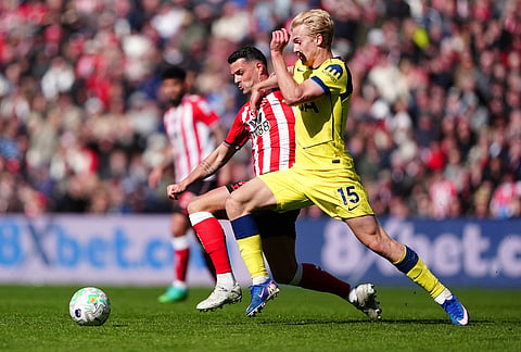 Sunderland's Granit Xhaka, left, and Tottenham Hotspur's Lucas Bergvall battle for the ball during the Premier League soccer match between Sunderland and Tottenham Hotspur, in Sunderland, England.
