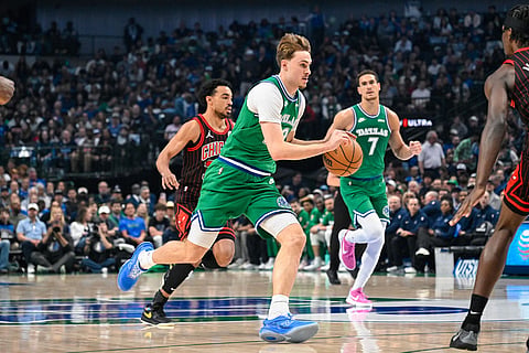 Dallas Mavericks' Cooper Flagg drives the ball during an NBA basketball game against the Chicago Bulls in Dallas.