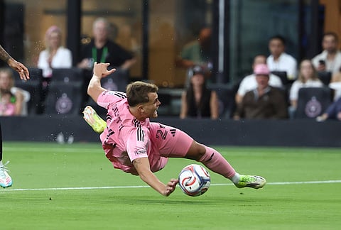Inter Miami forward Mateo Silvetti falls in the first half of an MLS soccer match against the New York Red Bulls, in Miami.