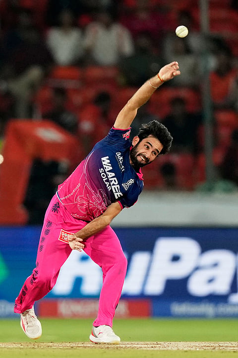 Rajasthan Royals' Ravi Bishnoi bowls a delivery during the Indian Premier League cricket match between Sunrisers Hyderabad and Rajasthan Royals in Hyderabad.