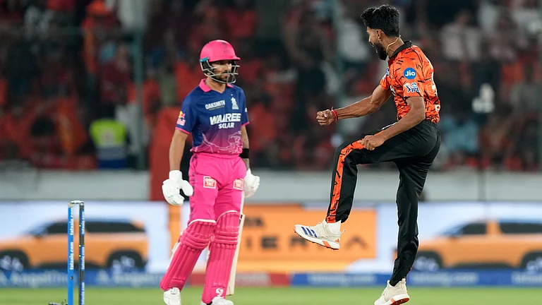 Praful Hinge celebrates his wicket by dismissing Dhruv Jurel during SRH vs RR IPL 2026 match. - AP Photo
