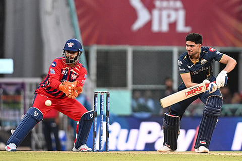 Gujarat Titans' captain Shubman Gill plays a shot during the Indian Premier League cricket match between Gujarat Titans and Lucknow Super Giants in Lucknow, India.