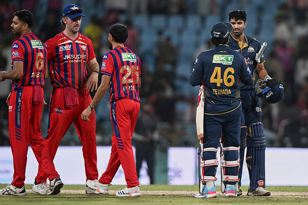 Gujarat Titans' Rahul Tewatia and Washington Sundar celebrate after winning the Indian Premier League cricket match between Gujarat Titans and Lucknow Super Giants in Lucknow, India. - | Photo: AP/STR