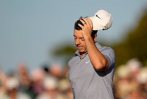 Rory McIlroy, of Northern Ireland, walks off the green after the third round of the Masters golf tournament at the Augusta National Golf Club in Augusta, Georgia. 