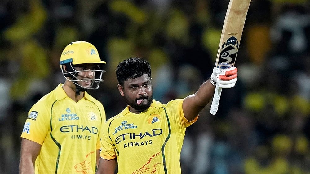 Chennai Super Kings' Sanju Samson, right, celebrates his century during the Indian Premier League cricket match between Chennai Super Kings and Delhi Capitals in Chennai. - | Photo: AP/Mahesh Kumar A.