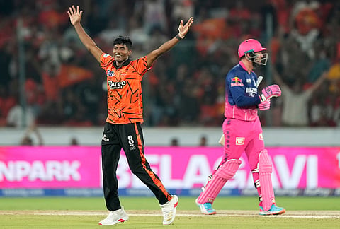 Sunrisers Hyderabad's Sakib Hussain celebrates the wicket of Rajasthan Royals' Donovan Ferreira, right, during the Indian Premier League cricket match between Sunrisers Hyderabad and Rajasthan Royals in Hyderabad.