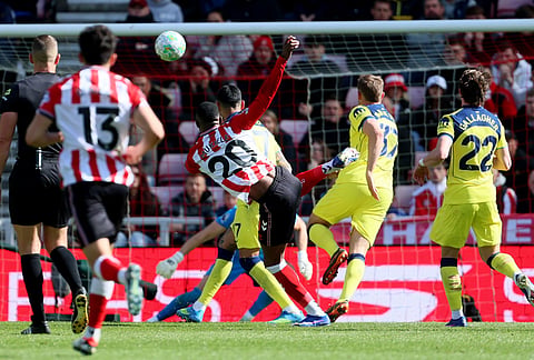 Sunderland's Nordi Mukiele, centre, scores his side's first goal of the game during the Premier League soccer match between Sunderland and Tottenham Hotspur, in Sunderland, England.
