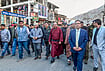 | Photo: @lg_ladakh/X via PTI : Ladakh Lt. Gov Vinai Kumar Saxena, centre, with officials during a visit to a market, in Kargil. 