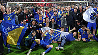(AP Photo/Armin Durgut) : Bosnia players celebrate after winning a penalty shootout at the end of the World Cup qualifying playoff final soccer match between Bosnia and Italy in Zenica, Bosnia, Tuesday, March 31, 2026. 