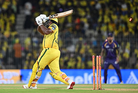 Chennai Super Kings' Sanju Samson is bold out by Kolkata Knight Riders' Kartik Tyagi during the Indian Premier League cricket match between Chennai Super Kings and Kolkata Knight Riders in Chennai.