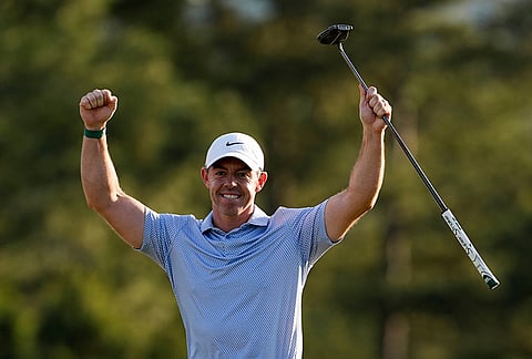 Rory McIlroy, of Northern Ireland, celebrates after winning the Masters golf tournament at the Augusta National Golf Club, in Augusta, Georgia.