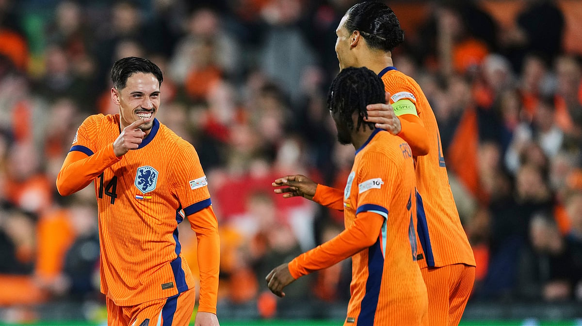 Netherlands' Tijjani Reijnders, left, celebrates after scoring his side second goal during the UEFA Nations League quarterfinal first leg match between the Netherlands and Spain at De Kuip stadium in Rotterdam, Netherlands, Thursday, March 20, 2025. - | Photo: AP/Peter Dejong