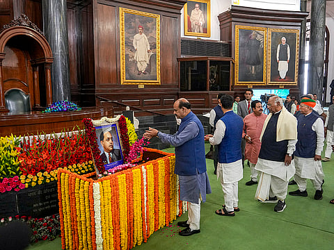 Lok Sabha Speaker Om Birla pays floral tribute to the portrait of Dr BR Ambedkar on his birth anniversary, observed as ‘Ambedkar Jayanti’, at Samvidhan Sadan, in New Delhi. Congress President and Rajya Sabha LoP Mallikarjun Kharge, MoS Arjun Ram Meghwal, Congress MP Rajeev Shukla and others are also seen. 