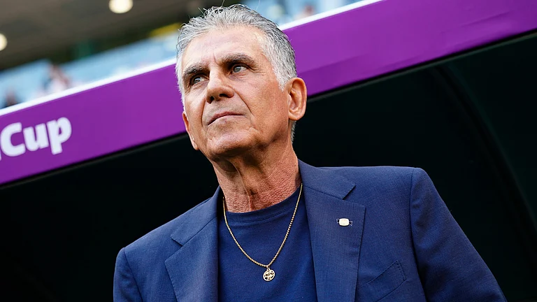 Iran's head coach Carlos Queiroz looks on ahead the start of the World Cup group B soccer match between Wales and Iran at the Ahmad Bin Ali Stadium, in Al Rayyan, Qatar, Nov. 25, 2022. - | Photo: AP/Pavel Golovkin