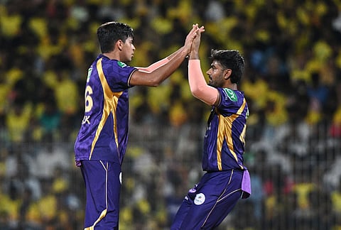 Kolkata Knight Riders' Kartik Tyagi, left, and Anukul Roy celebrates the wicket of Chennai Super Kings' Sanju Samson during the Indian Premier League cricket match between Chennai Super Kings and Kolkata Knight Riders in Chennai.