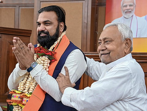JD(U) national president Nitish Kumar greets Bihar Deputy Chief Minister Samrat Choudhary during the National Democratic Alliance (NDA) legislators' meeting, in Patna.