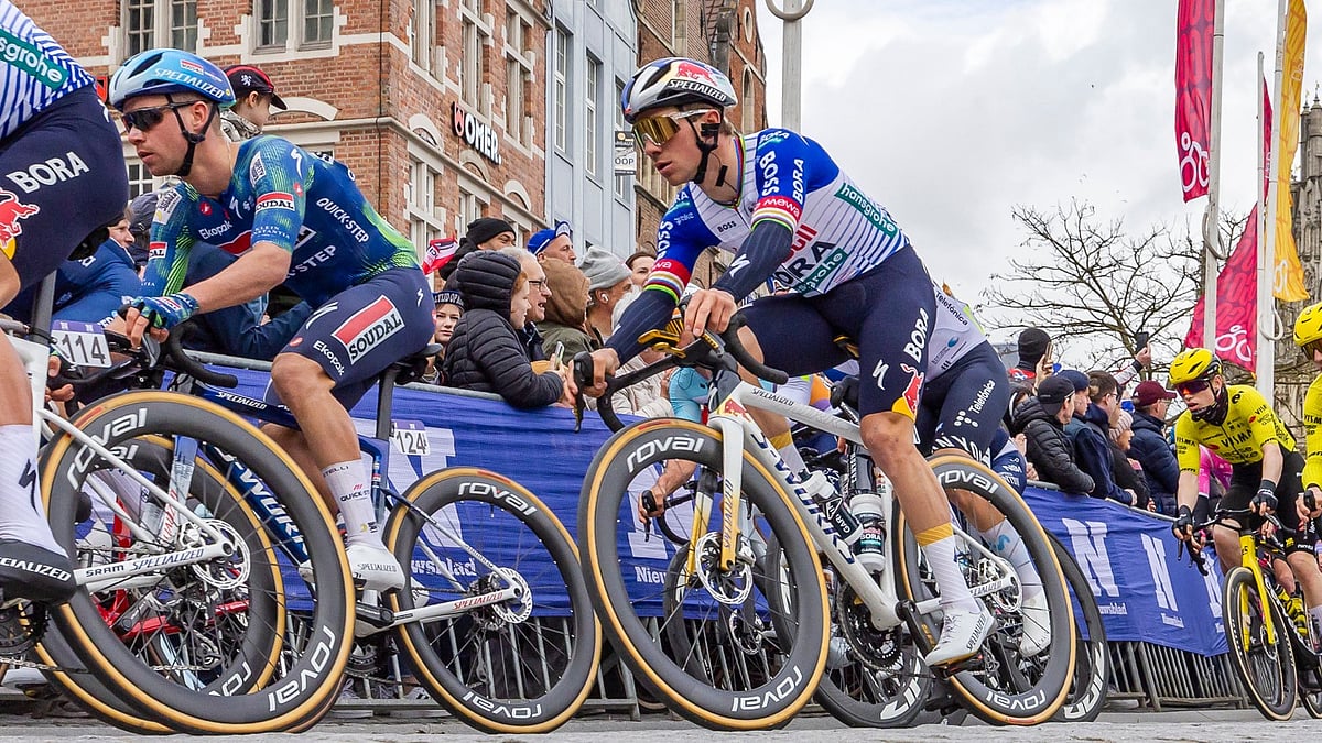 Remco Evenepoel of the Team Red Bull - Bora - Hansgrohe, right, competes during the Tour of Flanders in Oudenaarde, Belgium on Sunday, April 5, 2026 - (AP Photo/Geert Vanden Wijngaert)