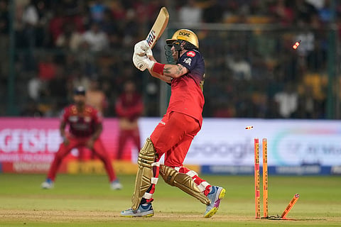 Royal Challengers Bengaluru's Phil Salt bowled out by Lucknow Super Giants' Prince Yadav during the Indian Premier League cricket match between Royal Challengers Bengaluru and Lucknow Super Giants in Bengaluru, India.