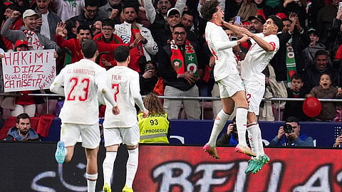 Morocco players cekebrate after a goal during a friendly soccer match between Morocco and Ecuador in Madrid, Spain,