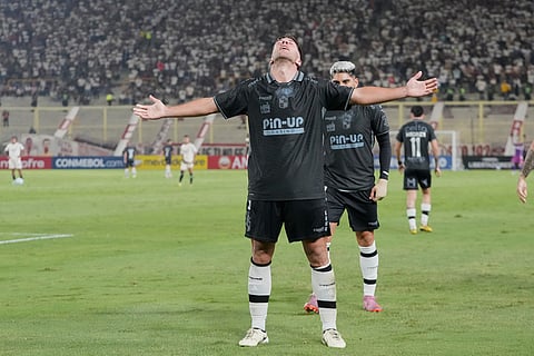 Nicolas Johansen of Chile's Coquimbo Unido celebrates scoring his side's second goal against Peru's Universitario during a Copa Libertadores Group B soccer match in Lima, Peru.