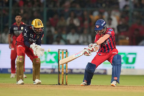 Lucknow Super Giants' Ayush Badoni hits a boundary during the Indian Premier League cricket match between Royal Challengers Bengaluru and Lucknow Super Giants in Bengaluru, India.