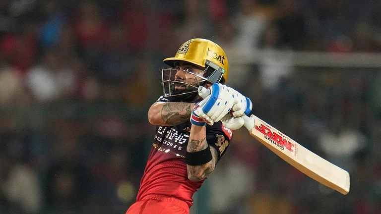 Royal Challengers Bengaluru's Virat Kohli hits a boundary during their Indian Premier League match in Bengaluru. - AP/Aijaz Rahi