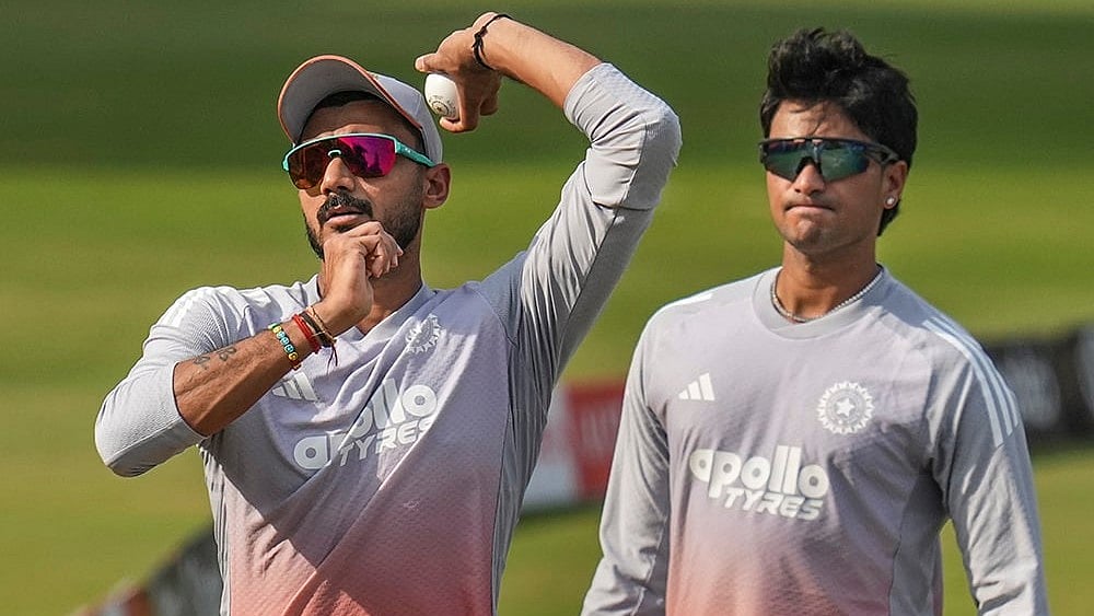 India’s Axar Patel, left, and Abhishek Sharma during a practice session on the eve of the first T20 cricket match of a series between India and South Africa, at Barabati Stadium, in Cuttack, Odisha. - | Photo: PTI/Shailendra Bhojak
