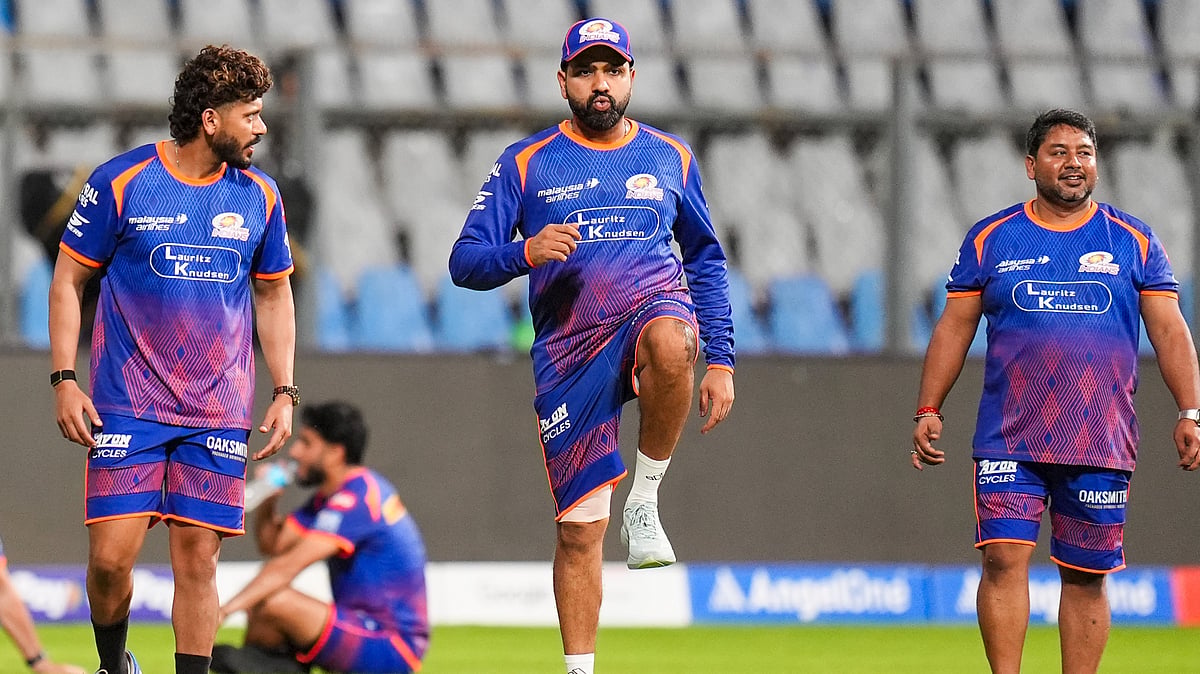 PTI/Kunal Patil : Mumbai Indians' Rohit Sharma, centre, during a practice session on the eve of the Indian Premier League 2026 match against Punjab Kings, at Wankhede Stadium.