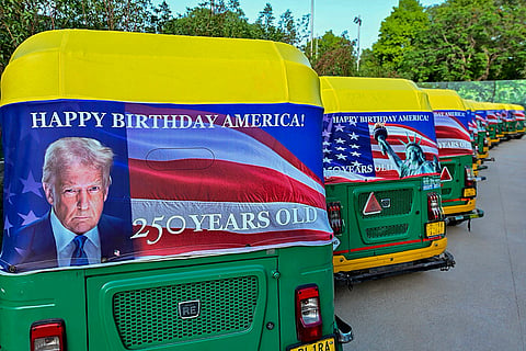 In this image posted on April 14, 2026, An auto-rickshaw with a banner as part of the “Freedom 250” celebrations, marking the 250th anniversary of the U.S. Declaration of Independence.