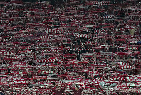 Bayern's supporters cheer during the Champions League quarterfinal second leg soccer match between Bayern Munich and Real Madrid in Munich, Germany.