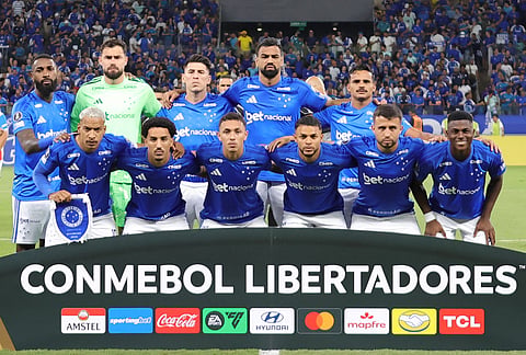 Players of Brazil's Cruzeiro line up for a team photo before a Copa Libertadores Group D soccer match against Chile's Universidad Catolica in Belo Horizonte, Brazil.