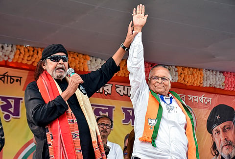 BJP leader Mithun Chakraborty addresses a public rally in support of party candidate for Beldanga constituency, Bharat Kumar Jhawar, right, ahead of the West Bengal Assembly Election, in Murshidabad district.