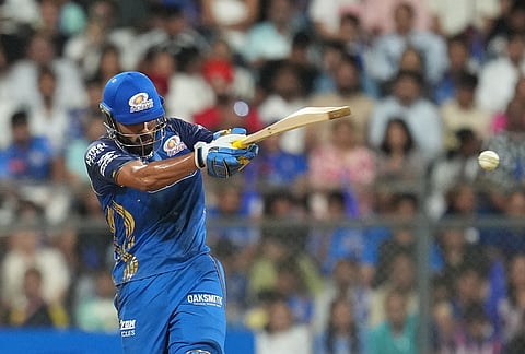 Mumbai Indians' Naman Dhir plays a shot during the Indian Premier League cricket match between Mumbai Indians and Punjab Kings in Mumbai.