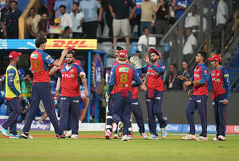 Punjab Kings' Marco Jansen, second left, celebrates the wicket of Mumbai Indians' captain Hardik Pandya with teammates during the Indian Premier League cricket match between Mumbai Indians and Punjab Kings in Mumbai.