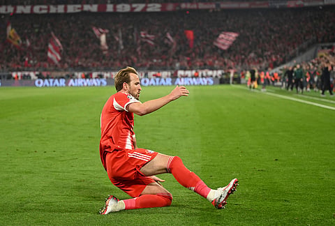 Bayern's Harry Kane celebrates after scoring his side's second goal during the Champions League quarterfinal second leg soccer match between Bayern Munich and Real Madrid in Munich, Germany.