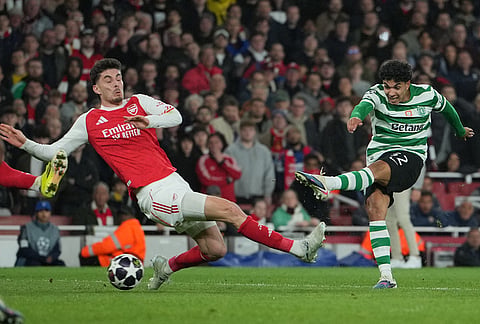 Sporting's Joao Simoes shoots during the UEFA Champions League second leg quarterfinal soccer match between Arsenal and Sporting in London, England.