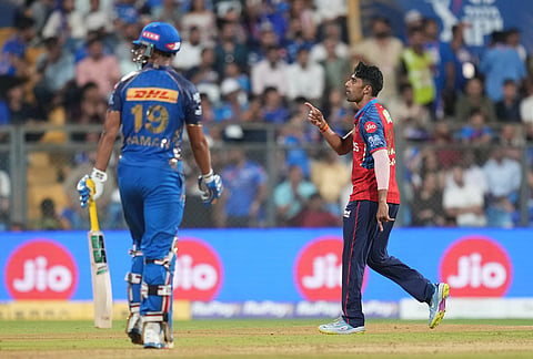 Punjab Kings' Shashank Singh celebrates the wicket of Mumbai Indians' Naman Dhir during the Indian Premier League cricket match between Mumbai Indians and Punjab Kings in Mumbai.