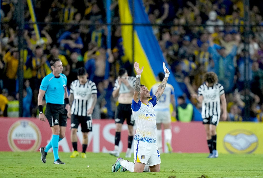| Photo: AP/Jorge Saenz : Enzo Copetti of Argentina's Rosario Central celebrates at the end of Copa Libertadores Group H soccer match against Paraguay's Libertad in Asuncion, Paraguay.