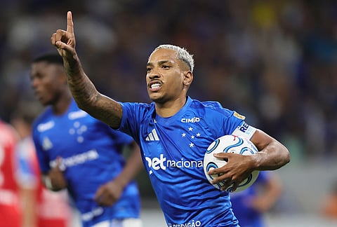 Matheus Pereira of Brazil's Cruzeiro celebrates after scoring his side's first goal from the penalty spot during a Copa Libertadores Group D soccer match against Chile's Universidad Catolica in Belo Horizonte, Brazil.