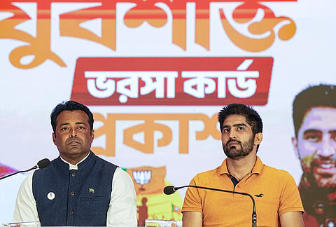 BJP leaders former tennis player Leander Paes and boxer Vijender Singh during the launch of BJP's Yuva Shakti Card, in Kolkata, West Bengal.