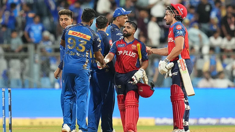 Mumbai Indians' Jasprit Bumrah congratulates Punjab Kings' wicketkeeper Prabhsimran Singh after Punjab Kings won against Mumbai Indians during the Indian Premier League cricket match in Mumbai, India, Thursday, April 16, 2026. - AP Photo/Rafiq Maqbool