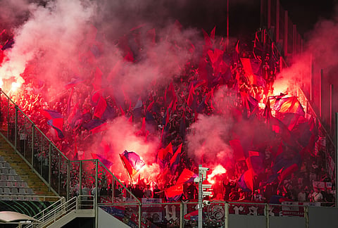 Crystal Palace supports light pyrotechnics during the Conference League quarterfinal second leg soccer match between Fiorentina and Crystal Palace in Florence, Italy.