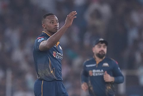 Gujarat Titans' Kagiso Rabada celebrates the wicket of Kolkata Knight Riders' Rinku Singh during the Indian Premier League cricket match between Gujarat Titans and Kolkata Knight Riders in Ahmedabad.