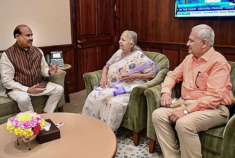 Lok Sabha Speaker Om Birla, left, in a meeting with former Lok Sabha Speaker Sumitra Mahajan, centre, at the Parliament House, in New Delhi. 