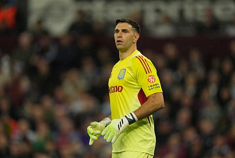 Aston Villa's goalkeeper Emiliano Martinez looks on during the Europa League quarterfinal second leg soccer match between Aston Villa and Bologna, in Birmingham, England.