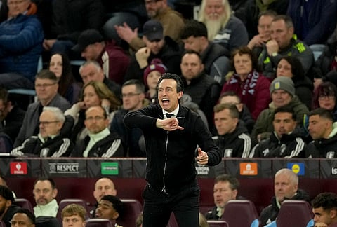 Aston Villa's head coach Unai Emery reacts during the Europa League quarterfinal second leg soccer match between Aston Villa and Bologna, in Birmingham, England.