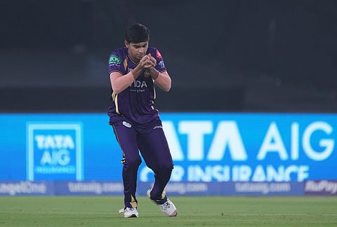 Kolkata Knight Riders' Kartik Tyagi takes the catch to dismiss Gujarat Titans' Sai Sudharsan during the Indian Premier League cricket match between Gujarat Titans and Kolkata Knight Riders in Ahmedabad.