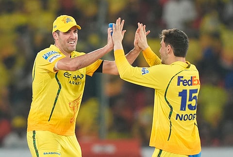 Chennai Super Kings' Jamie Overton, left, and Noor Ahmed celebrate wicket of Sunrisers Hyderabad's Abhishek Sharma during the Indian Premier League cricket match between Sunrisers Hyderabad and Chennai Super Kings in Hyderabad.